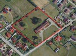 Nieruchomość zabudowana budynkiem usługowym (magazynowo-biurowym) stanowiąca działki oznaczone numerami geodezyjnymi 833/5, 833/6, 833/7, 833/8, 833/9