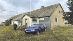 zabudowana nieruchomość gruntowa - działka gruntu nr 14/1 o obszarze 6 184,00 m2; dom o pow. 82,39 m2 i budynek gospodarczy o pow. 186,13 m2 oraz garaż do rozbiórki